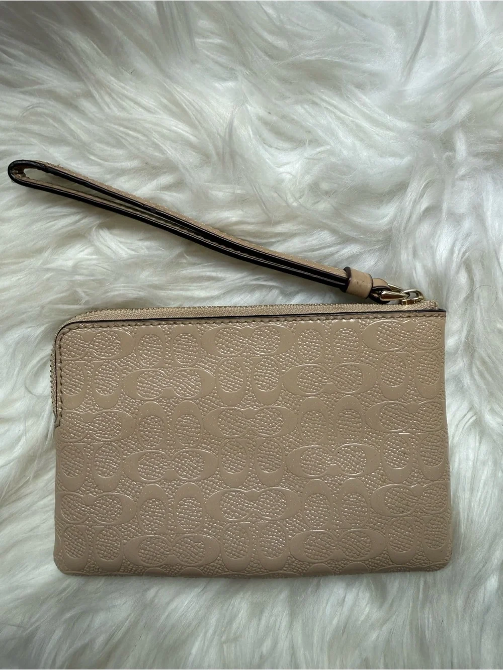 COACH Embossed Signature Wristlet in Neutral Beige